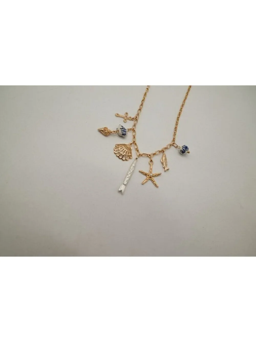 NWT Josslyn Gold Tone Charm Necklace Seashell Starfish Fish Pendant Coastal Boho